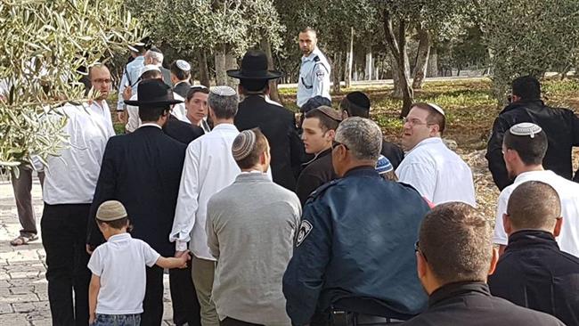 Israeli settlers and extremists are seen at the al-Aqsa Mosque compound in East Jerusalem al-Quds on April 12, 2017. (Photo by Palestine Now news agency)
