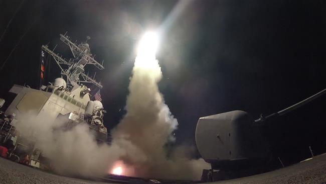 In this image released by the US Navy, the guided-missile destroyer USS Porter conducts strike operations while in the Mediterranean Sea on April 7, 2017. (Photo by AFP)
