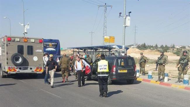 Israeli military forces gather at the site of an alleged car-ramming attack near Gush Etzion settlement, south of Bethlehem, in the occupied West Bank on April 19, 2017. (Photo by Shms news agency)
