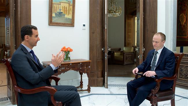 President Bashar al-Assad speaks in an interview with Sputnik on April 20, 2017