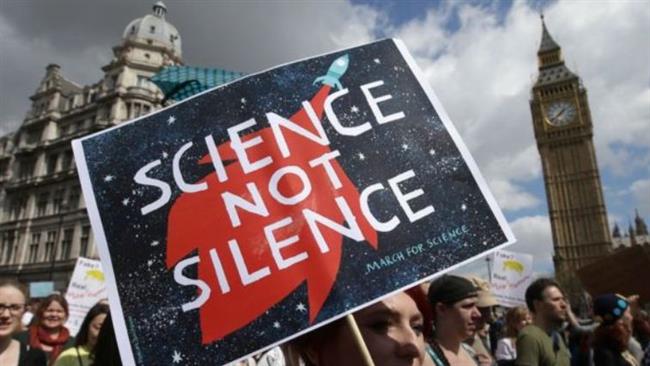 Thousands of protesters rally in UK against Trump policies against science, climate change
