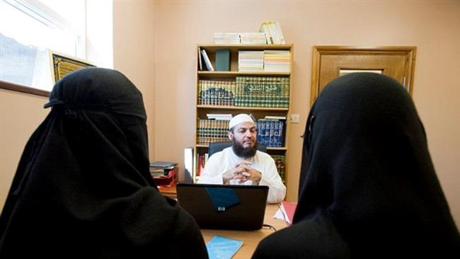 Two British Muslim women apply for a divorce in front the sharia council judge Sheikh Haitham Al Haddad.
