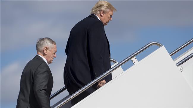 US President Donald Trump and Secretary of Defense Jim Mattis (L) board Air Force One prior to departing from Andrews Air Force Base in Maryland, March 2, 2017. (Photos by AFP)
