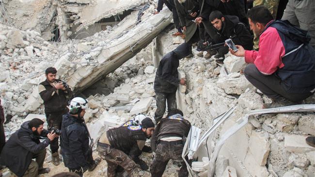 Syrian civil defense volunteers dig through the rubble of a mosque following an airstrike in Aleppo, Syria, March 17, 2017. (Photo by AFP)