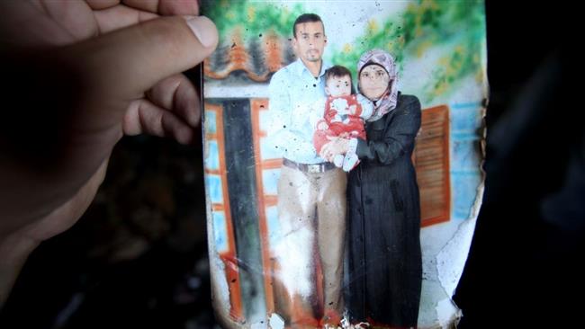 A file photo of 18-month-old Ali Dawabsheh and his parents, who were killed in an arson attack by Israeli settlers in the village of Duma in the occupied West Bank on July 31, 2015
