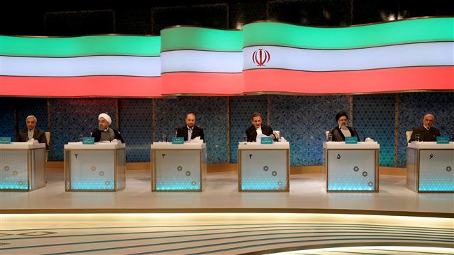 The six Iranian presidential candidates attend a live debate on state TV in Tehran, April 28, 2017. (Photo by AFP)
