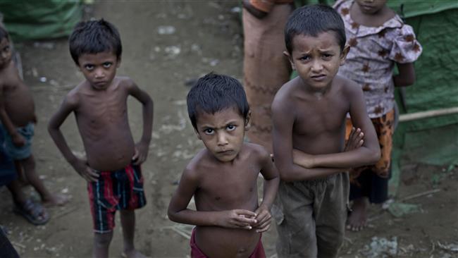 Rohingya children gather at the Dar Paing camp for Muslim refugees, north of Sittwe, western Rakhine State, Myanmar. (By AP)