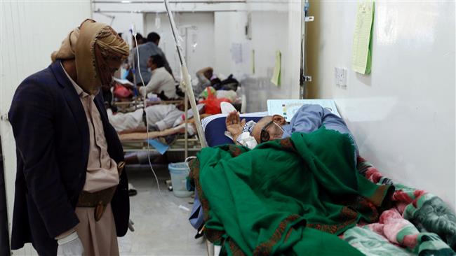 A Yemeni man suspected of being infected with cholera receives treatment at a hospital in the capital Sana