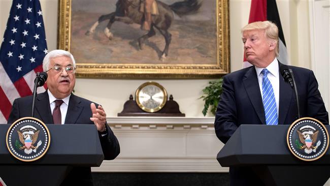 Palestinian President Mahmoud Abbas (L) speaks in a joint press conference with his US counterpart, Donald Trump