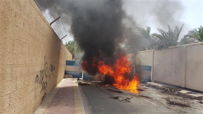 Tires set ablaze during clashes between Bahraini regime forces and protesters in Safariyah on May 23, 2017.
