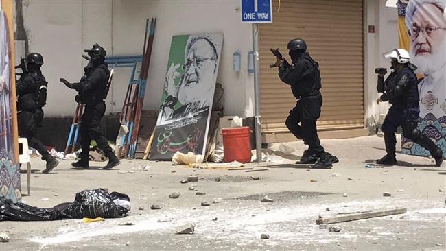 This image provided by an activist shows Bahraini forces during a raid on a sit-in Diraz, Bahrain, May 23, 2017. (Via AP)
