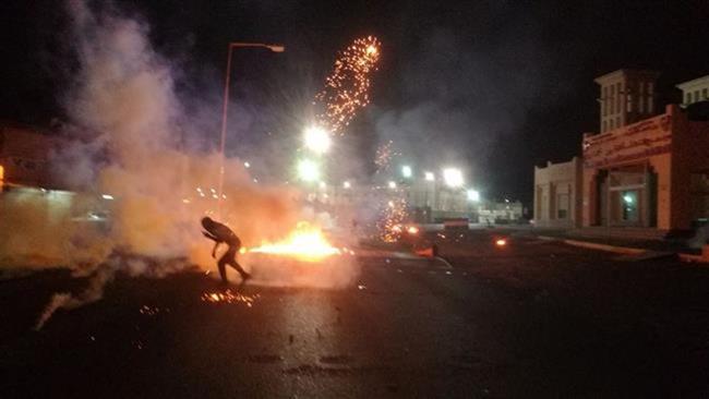 The photo shows clashes in Diraz, Bahrain, May 23, 2017, following a raid on Shia cleric Sheikh Isa Qassim