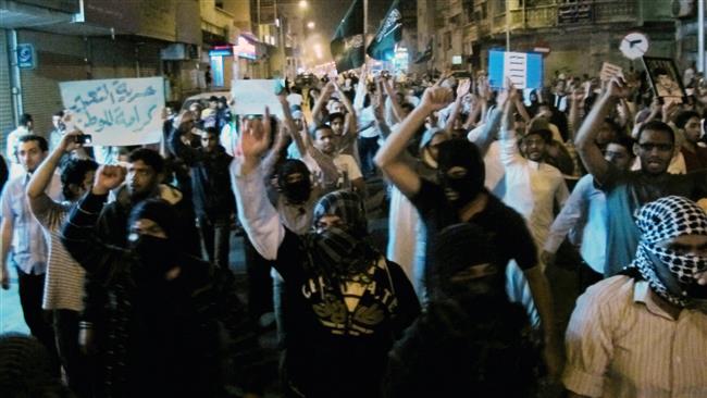 Anti-regime protesters chanting slogans in Qatif, Saudi Arabia. (By AP)