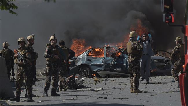 Afghan security forces are seen at the site of a car bomb attack in Kabul on May 31, 2017. (Photo by AFP)
