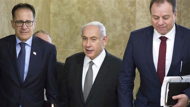 Israeli Prime Minister Benjamin Netanyahu (C) arrives for a weekly cabinet meeting at his office in the occupied Jerusalem al-Quds on June 11, 2017. (Photo by AFP)
