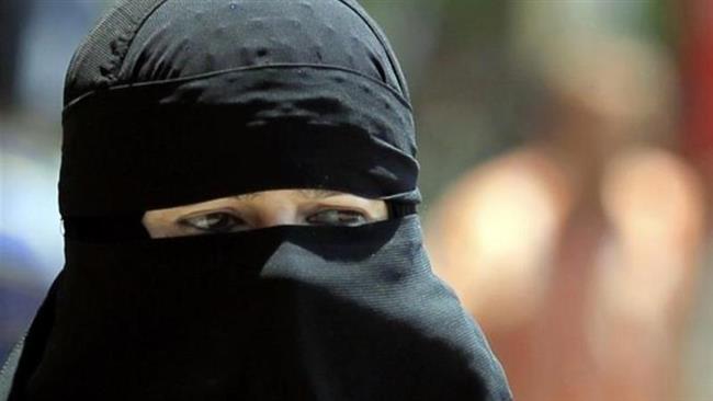 File photo shows a burqa-wearing Muslim woman. (Photo by Reuters)
