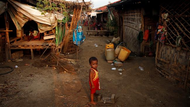 A Rohingya boy stands in a refugee camp outside Kyaukpyu in Rakhine State, Myanmar, on May 18, 2017. (Photo by Reuters)
