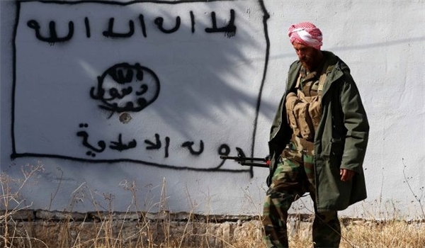 ISIL ISIS Daesh flag on a wall in Syria