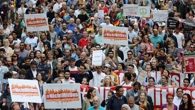 Demonstrators take part in a “Peace March” of Muslims and friends against terrorism and violence in Cologne, western Germany, June 17, 2017. (Photo by AFP)
