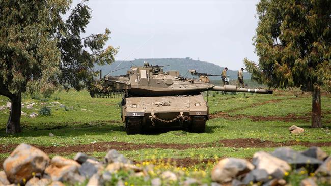 Israeli soldiers take part in a military training in the Israeli-occupied Golan Heights on March 20, 2017. (Photo by AFP)
