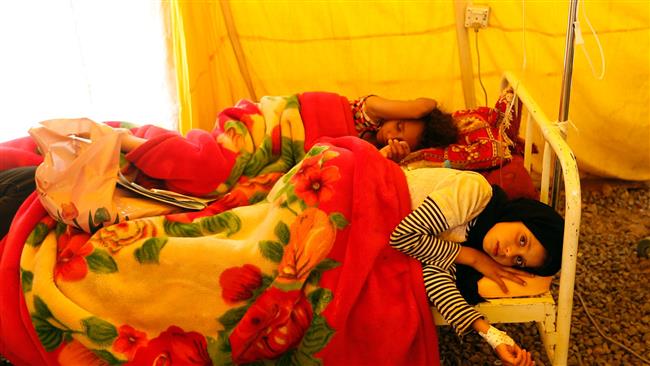 Yemeni children infected with cholera receive treatment at Sabaeen Hospital in Sana