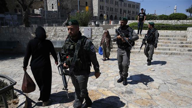 Israeli police walk outside Damascus Gate in the occupied Old City of Jerusalem al-Quds on June 17, 2017. (Photo by AFP)
