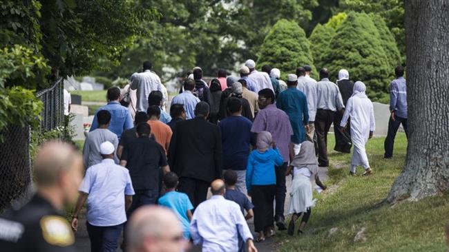 Mourners walk into Sterling Cemetery where Nabra Hassanen, who was killed Sunday, will be laid to rest in Sterling, Virginia, on June 21, 2017. (Photo by Getty Images) 