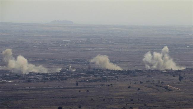 This photo taken from the Golan Heights on September 10, 2016, shows smoke rising from the Syrian village of Jubata al-Khashab shortly after Israeli aircraft struck Syrian army positions in the area. (Photo by AFP)

