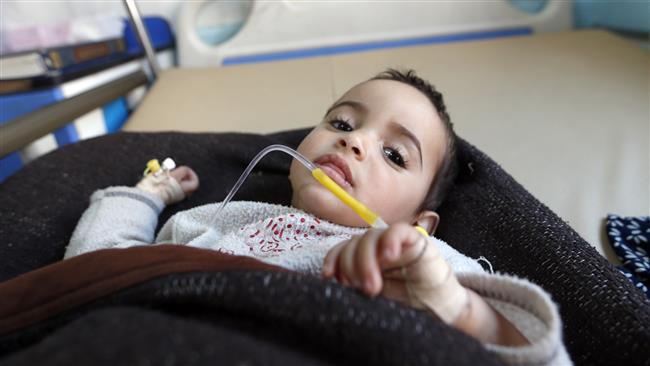 A Yemeni child suspected of being infected with cholera receives treatment at Sabaeen Hospital in Sana