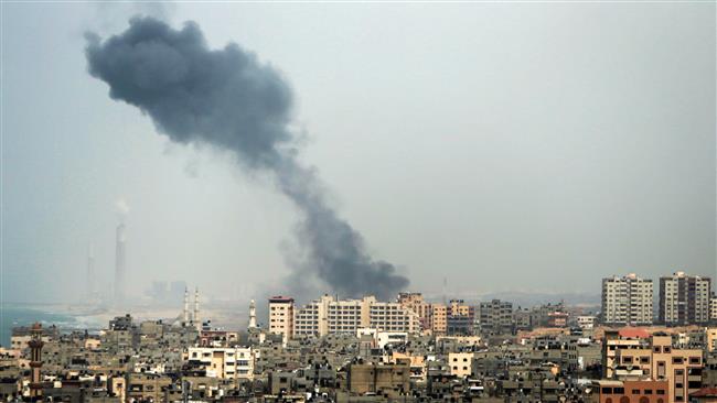 A smoke plume rises in Gaza City after an Israeli airstrike on March 18, 2017. (Photo by AFP)
