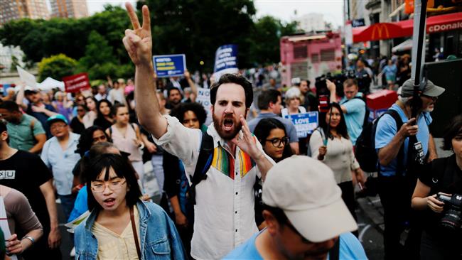 People march at Union Square against President Trump