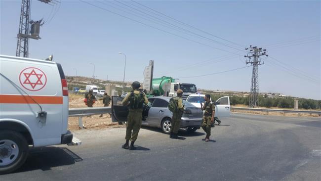 This photo shows the aftermath of an alleged stabbing attack on the road between the Palestinian town of Tuqu’ and Israeli Efrat settlement on July 10, 2017. (Photo by Palestinian Information Center)
