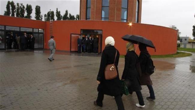 Muslim women on their way to the opening ceremony for the Islamic cemetery in Vienna, Austria.