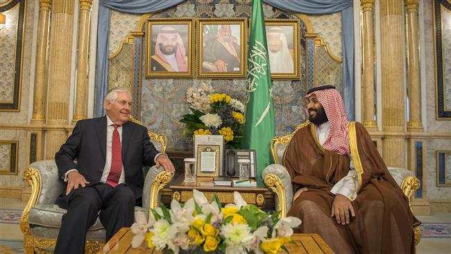 A handout picture provided by the Saudi Royal Palace on July 12, 2017 shows Crown Prince Mohammed bin Salman Al Saud (R) meeting with US Secretary of State Rex Tillerson in Jeddah, Saudi Arabia. (Photo by AFP)
