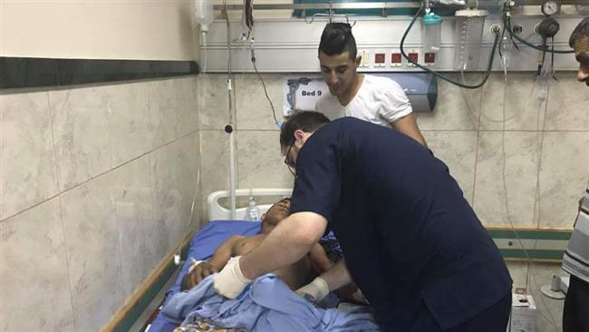 A Palestinian, who is wounded in clashes with Israeli forces in the Jenin refugee camp in northern West Bank, is being treated at a hospital on July 12, 2017.
