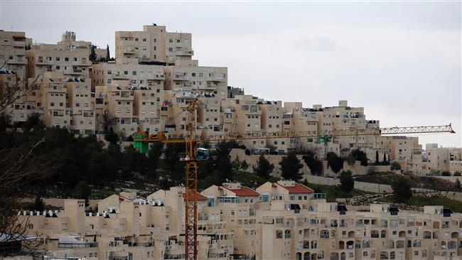 A picture taken on January 26, 2017 shows new apartments under construction in the Israeli settlement of Har Homa situated in East Jerusalem al-Quds. (By AFP)

