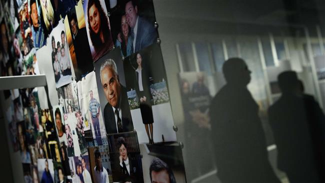 Photographs of 9/11 victims are displayed in a room in the new 9/11 Tribute Museum, June 13, 2017 in New York City. (Getty Images)
