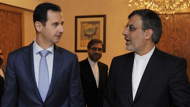 In this photo released by SANA, Syrian President Bashar Assad (L) meets with Iranian Deputy Foreign Minister for Arab-African Affairs Hossein Jaberi Ansari in Damascus, December 22, 2016. (Via AP)
