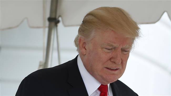 US President Donald Trump walks out from the White House in Washington before his departure to Norfolk, Virginia on July 22, 2017. (AFP photo)