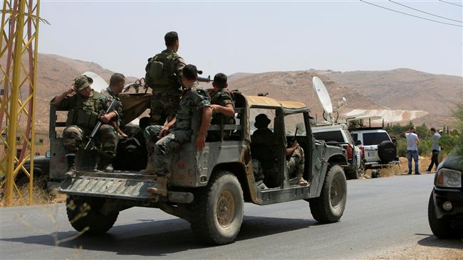 Lebanese army soldiers patrol a street in Labweh, at the entrance of the border town of Arsal, Lebanon, on July 21, 2017. (Photo by Reuters)