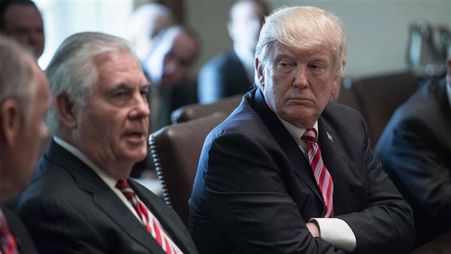 US President Donald Trump (R) listens to Secretary of State Rex Tillerson during a cabinet meeting in Washington, DC, on June 12, 2017. (Photo by AFP) 