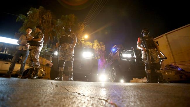Forces stand guard outside the Israeli embassy in the residential Rabiyeh neighborhood of the Jordanian capital, Amman, following an ‘incident’ on July 23, 2017. (Photo by AFP)
