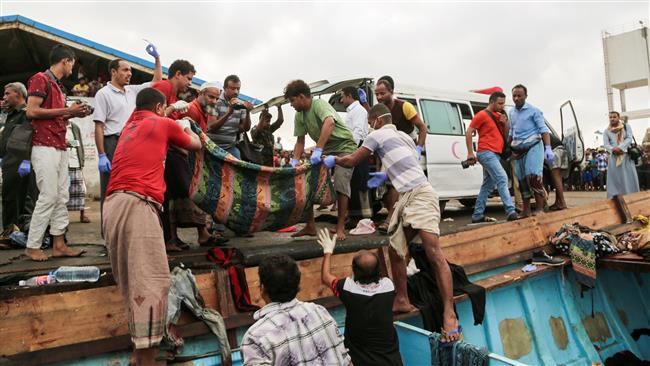 Bodies of Somali refugees, killed in attack by a helicopter while traveling in a boat off the coast of Yemen, are at the port in Hudaydah, Yemen, March 17, 2017. (Photo by AP)
