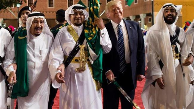 US President Donald Trump, second right, and Saudi King Salman bin Abdulaziz Al Saud, left, take part in a sword dance in the Saudi capital, Riyadh, May 20, 2017. (Photos by AFP)