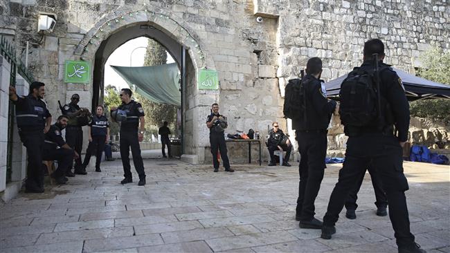 Israeli police officers stand outside the al-Aqsa Mosque compound in Jerusalem