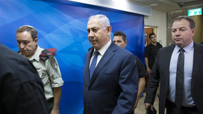 Israeli Prime Minister Benjamin Netanyahu (C) attends the weekly cabinet meeting at his office in occupied Jerusalem al-Quds on July 23, 2017. (Photo by AFP)
