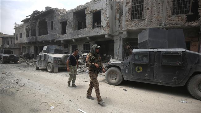 Iraqi Counter-Terrorism Service (CTS) forces patrol the Old City of Mosul on July 7, 2017, during the Iraqi government forces