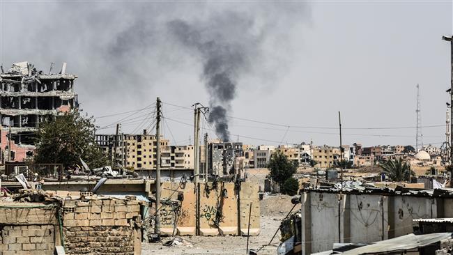 Smoke is seen following an airstrike on the western frontline of Raqqah on July 17, 2017, during an offensive by the US-backed Syrian Democratic Forces. (Photos by AFP)
