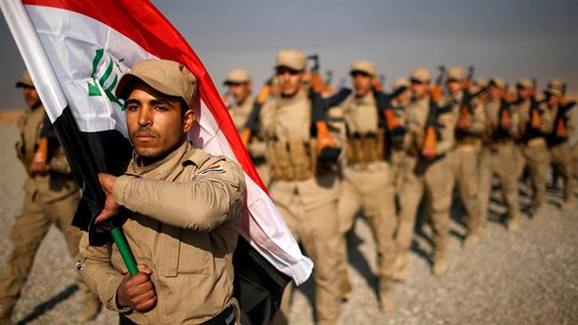 Iraqis march during the funeral of members from the Iraqi government forces the Popular Mobilization units, who were killed in the Khalidiyah area of Iraq