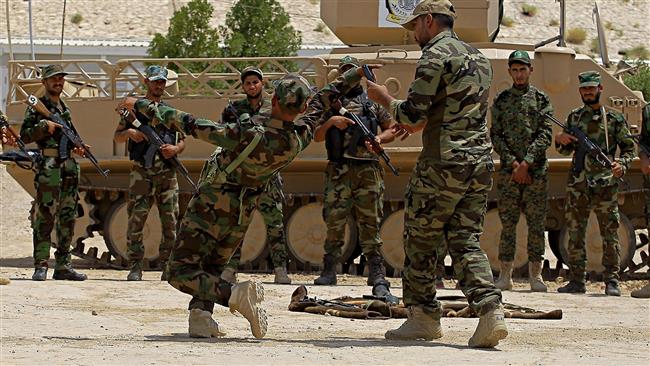 In this July 18, 2017 photo, Iraqi volunteer forces train in their camp in Najaf. (By AP)
